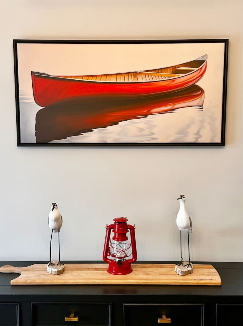 Nautical decor, highlighted by the iconic red canoe.