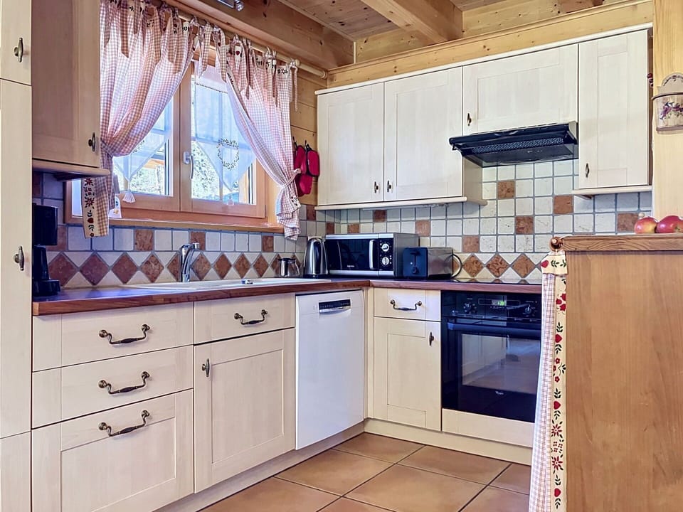 Kitchen, Wood, Cabinetry, Interior Design, Kitchen Appliance, Countertop, Flooring, Major Appliance, Furniture, Drawer