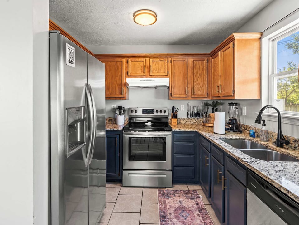 Kitchen: Fully equipped kitchen with modern appliances, ample counter space, and everything you need for easy home-cooked meals during your stay.