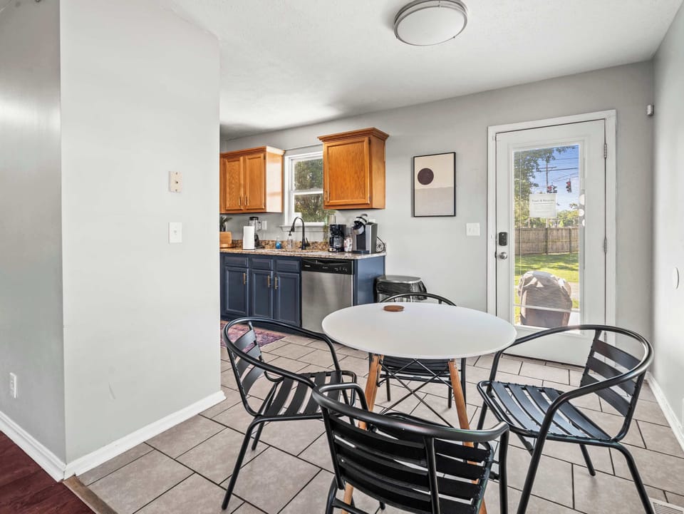 Dining Area: Cozy dining room featuring modern décor, comfortable seating, and the perfect setting for family dinners or casual breakfasts.