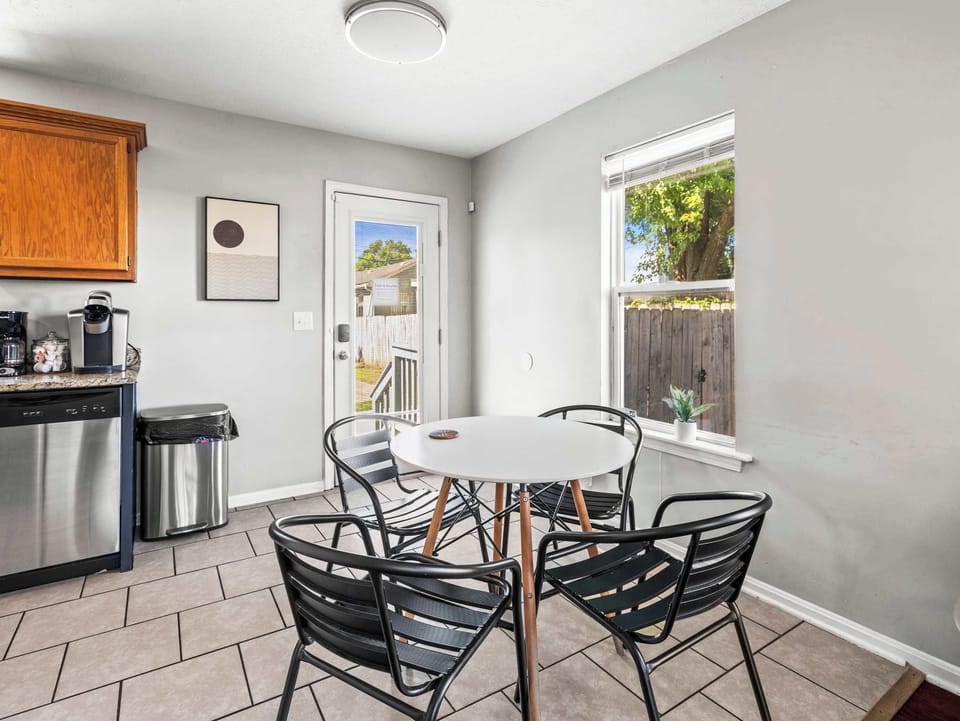 Dining Area: Cozy dining room featuring modern décor, comfortable seating, and the perfect setting for family dinners or casual breakfasts.
