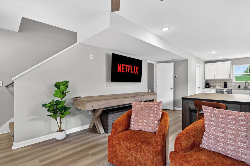 Living Room: Relax in a bright and inviting living room featuring comfortable seating, stylish décor, and plenty of space to unwind after a day of exploring the area.