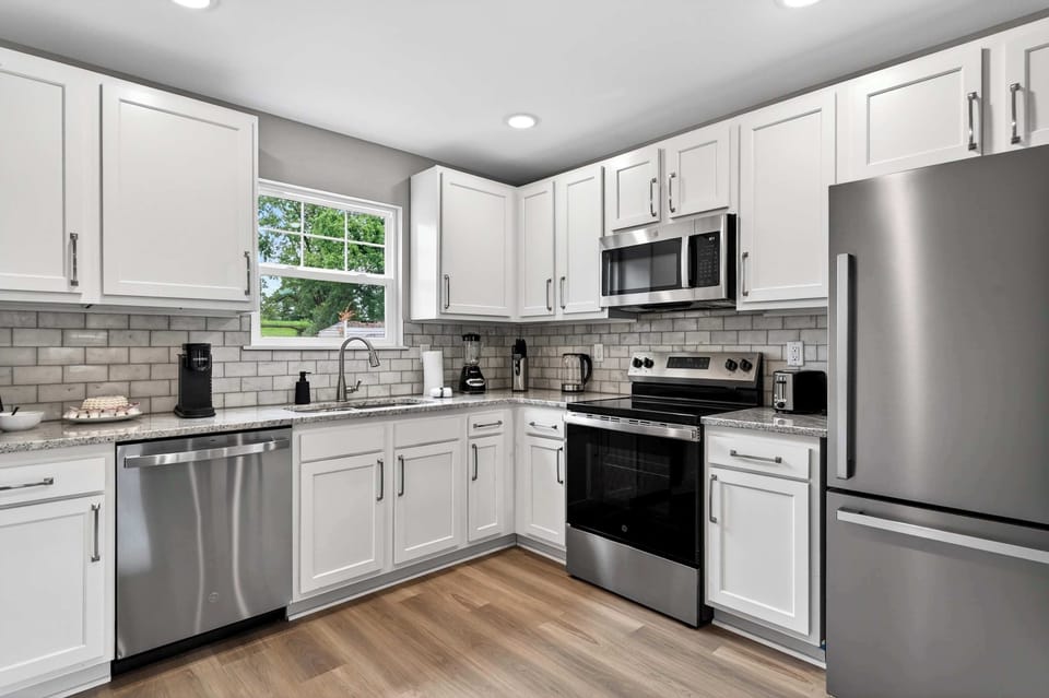 Kitchen: Prepare meals with ease in the fully equipped kitchen, featuring modern appliances, ample counter space, and everything needed for your stay.