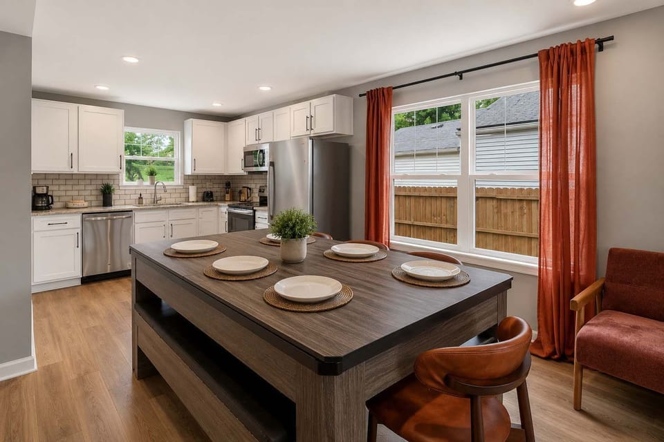 Dining Area 1: Gather around the dining table in Unit A, offering a comfortable space for shared meals, game nights, remote work, or planning your adventures.