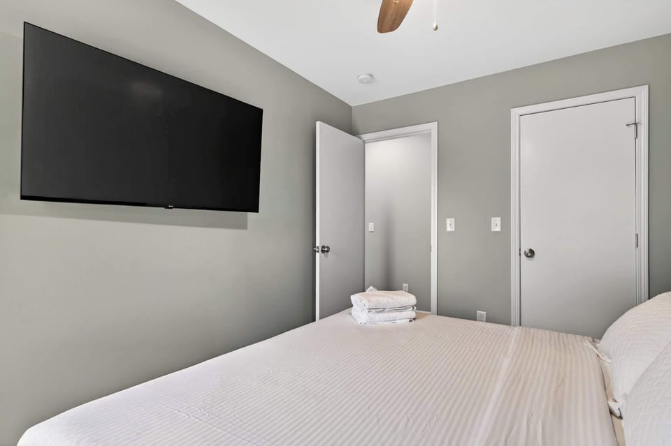 Bedroom 1: This cozy bedroom combines a comfortable queen-size bed with a relaxing ambiance, making every night feel like home.