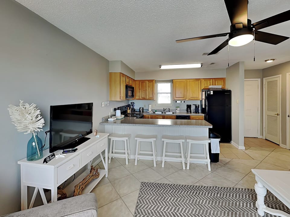 Living Area - TV and Bar Seating