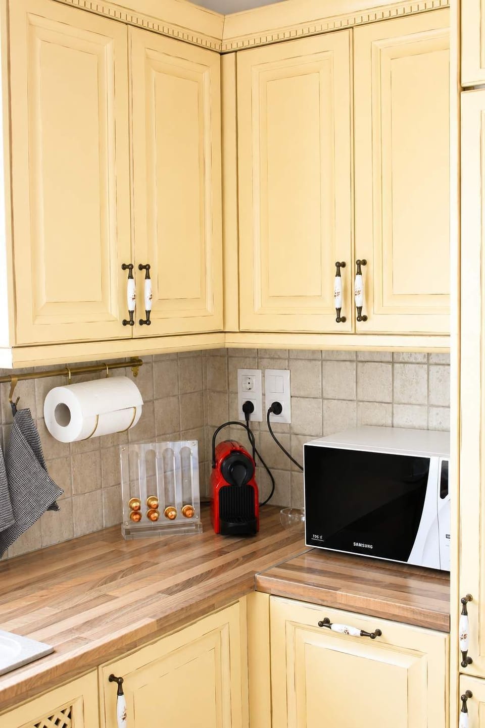 Wooden cabinets and kitchen essentials.