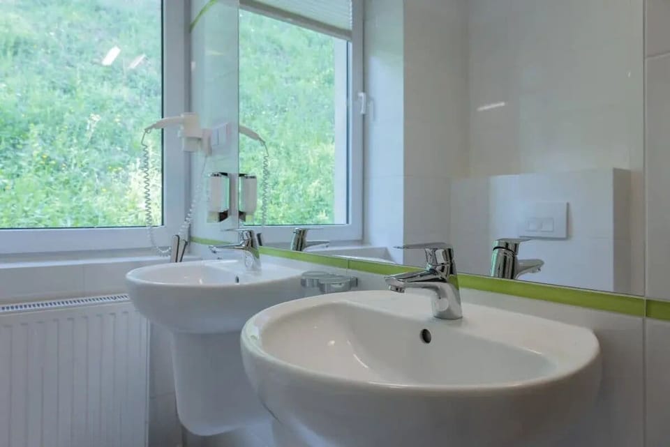 Triple Room, Balcony | Bathroom | Shower, rainfall showerhead, free toiletries, hair dryer