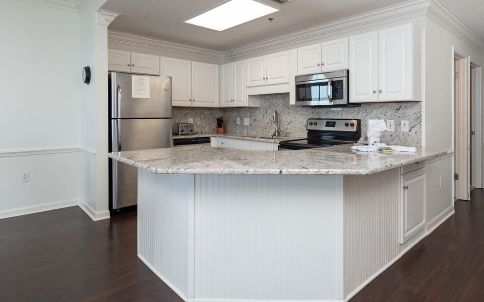Condo, 3 Bedrooms | Private kitchen | Fridge, oven, coffee/tea maker