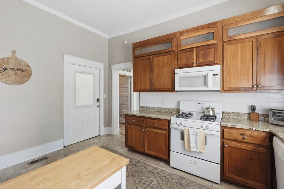 Off the kitchen is the access to the back deck and yard!