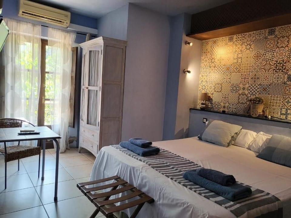 Deluxe Double Room, Balcony, Garden View | Free WiFi