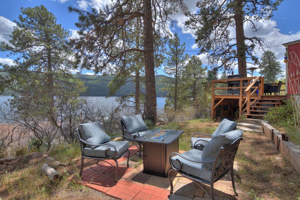 Gather around the fire pit and enjoy the lake views.