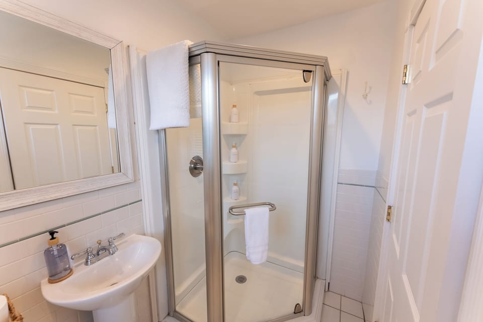 First floor full bathroom. We provide hand soap, shampoo, conditioner, and body wash