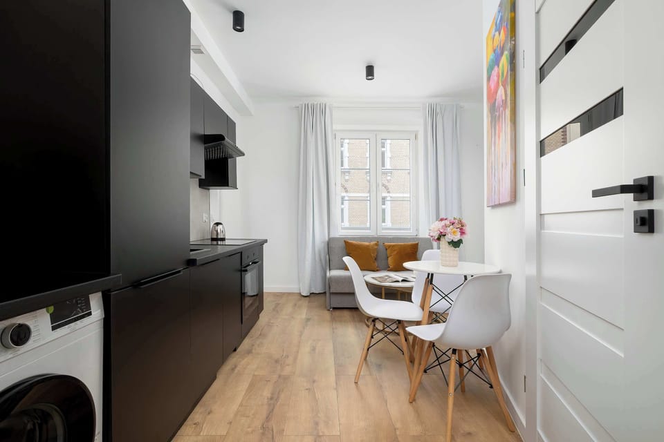 The living room has a modern look and comfortable furniture.