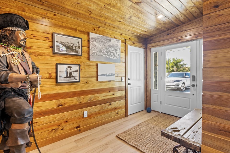 Step into rustic charm with wood-paneled walls showcasing local history and Native American décor greeting your arrival.