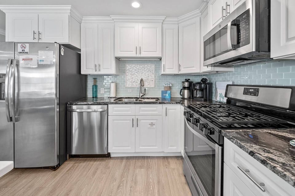 This open kitchen is the heart of the home and ready for your vacation recipes!