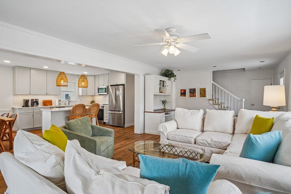 Step into your bright open-concept retreat where the living room flows seamlessly into a fully equipped kitchen—perfect for gathering, cooking, and unwinding after a day exploring.