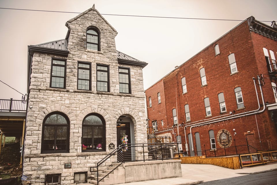 The building includes a coffee shop below