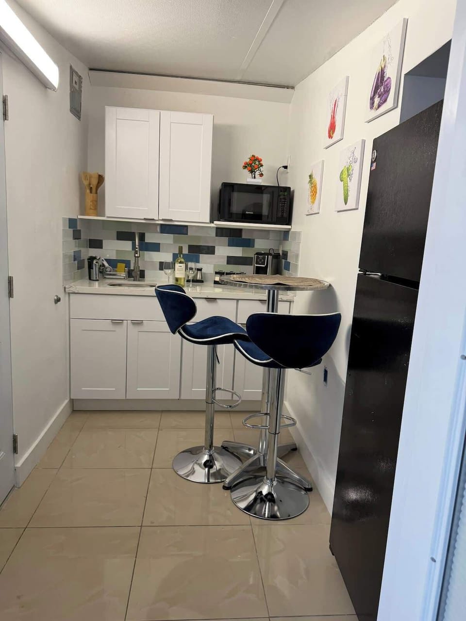 Compact kitchenette with essentials for easy meal prep and morning coffee.
