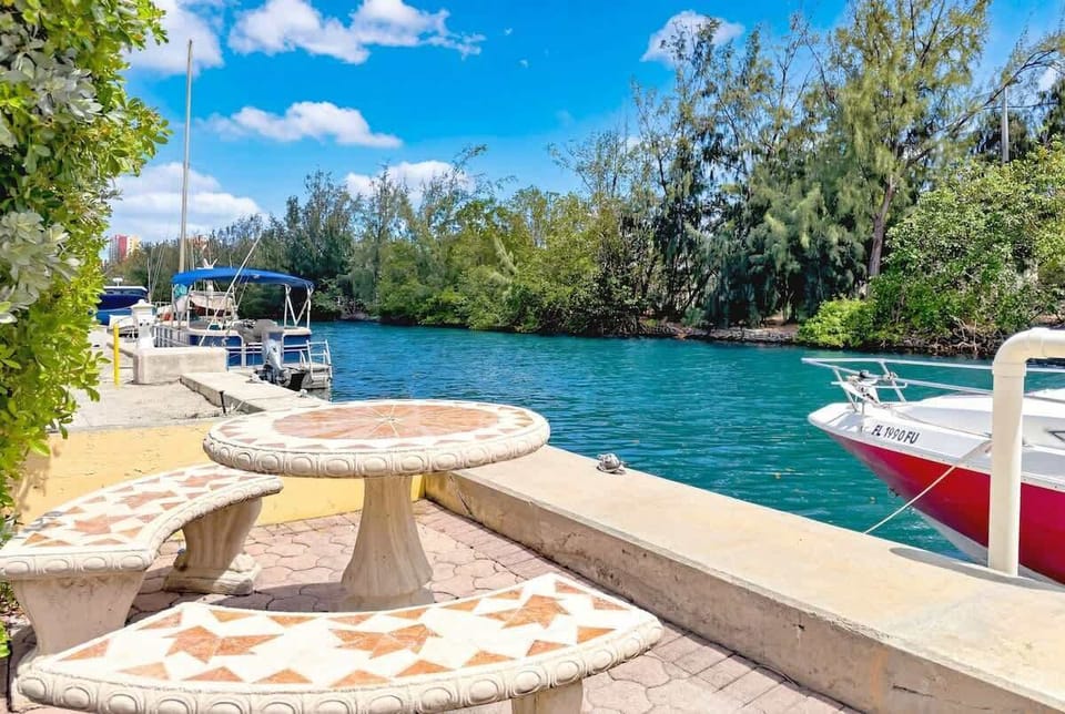 Canal access with dock, perfect for private boat pick-up and drop-off