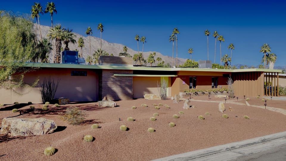 Desert zen garden of a beautifully restored home from 1950.  