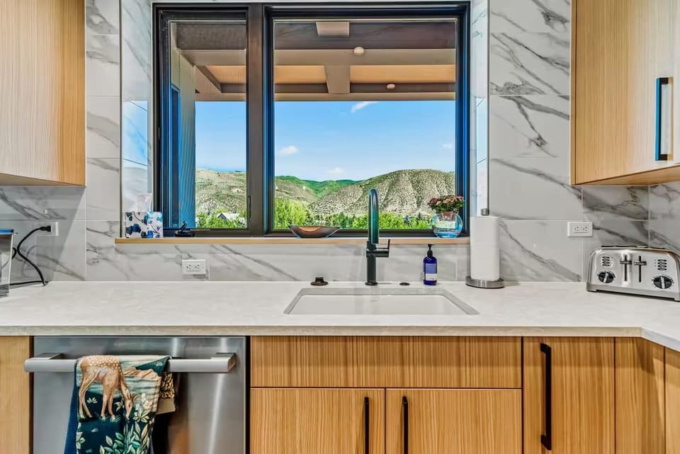 Kitchen: Updated with new appliances, fully stocked for a home-cooked meal