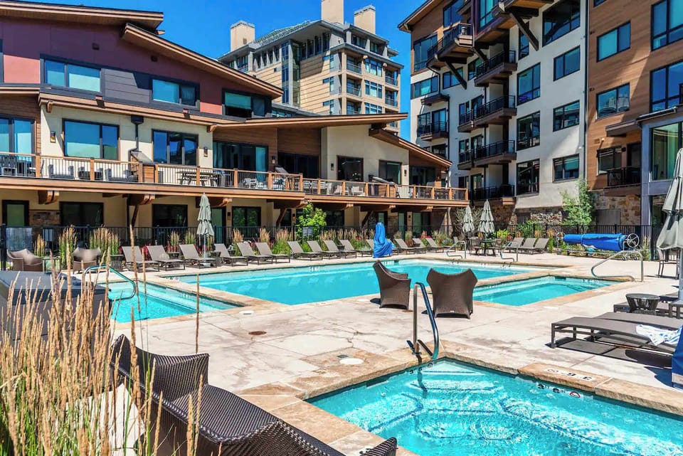 Resort style shared pool and hot tub.
