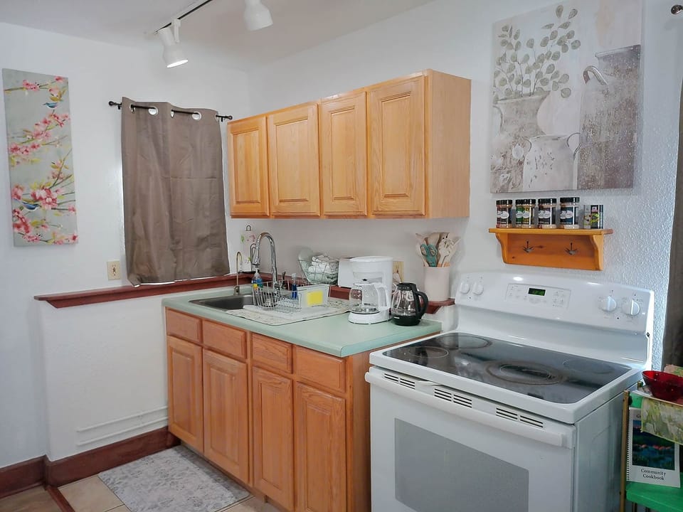 Fully Stocked Kitchen with Tea Kettle and Drip Coffee Maker