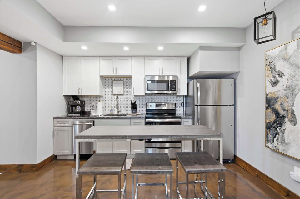 The studio’s stylish kitchen offers ample space & all the comforts of home​