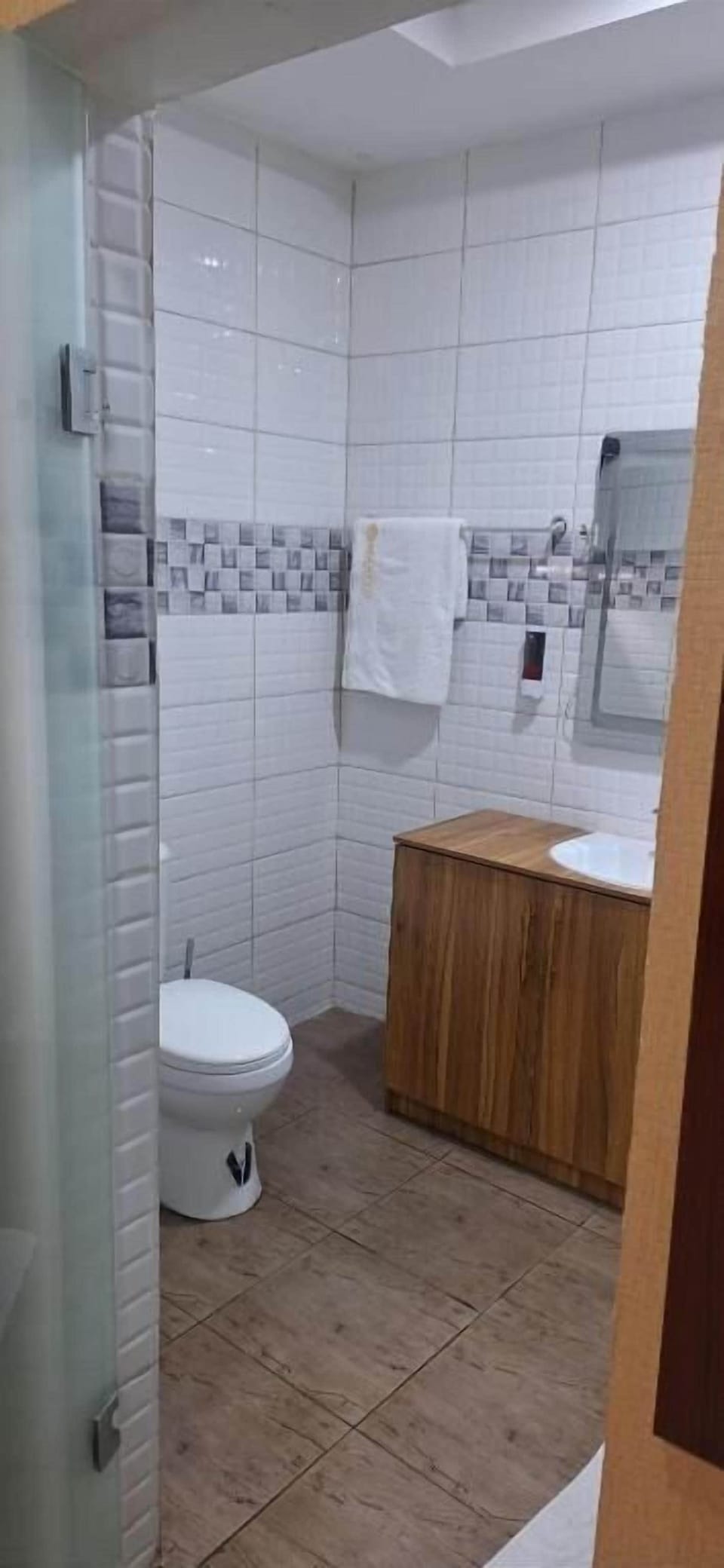 Shower, towels, soap, toilet paper