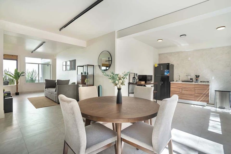 
Gather for meals in our bright, open dining area, connected to the living room.