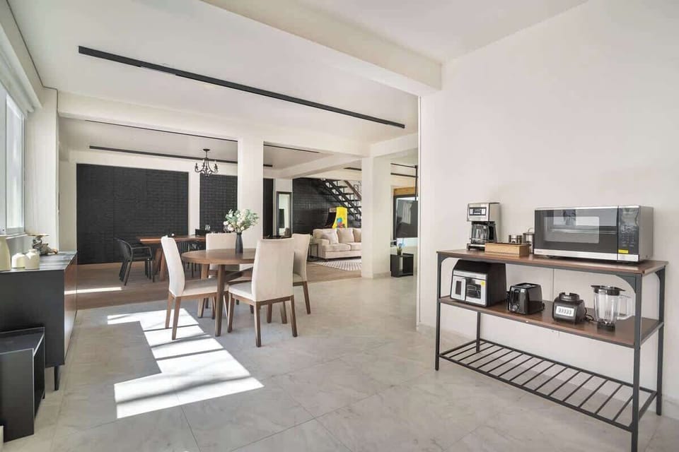 Combined dining and kitchen area, ideal for entertaining and family gatherings.