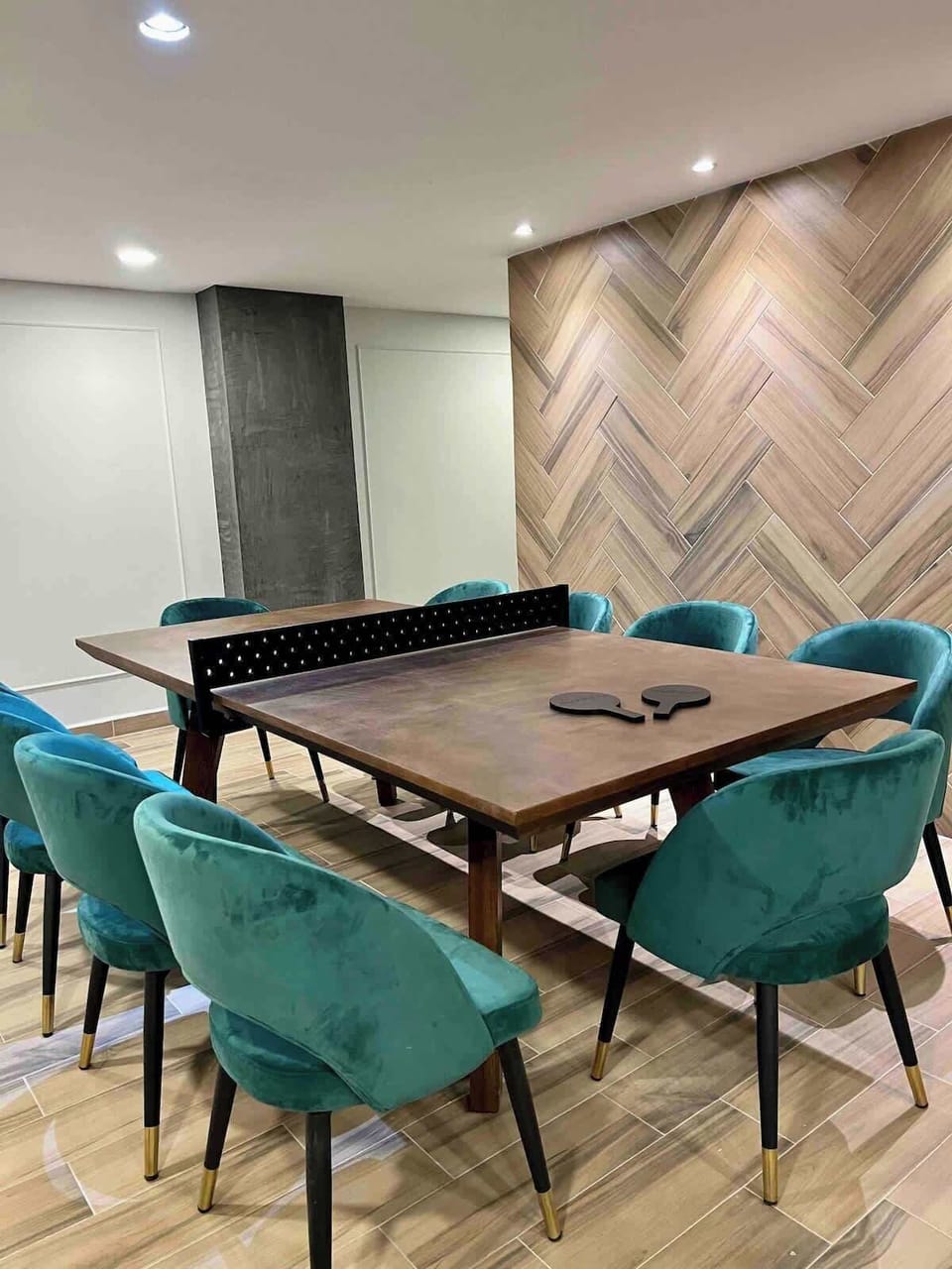 A versatile dining table for 8 that transforms into a ping pong table.