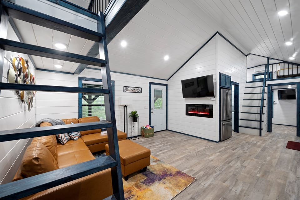 Living Room with electric fireplace and TV