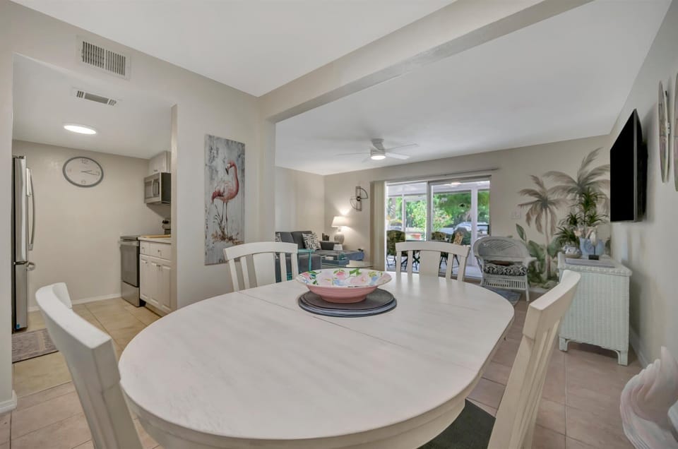 Open dining and living with coastal decor