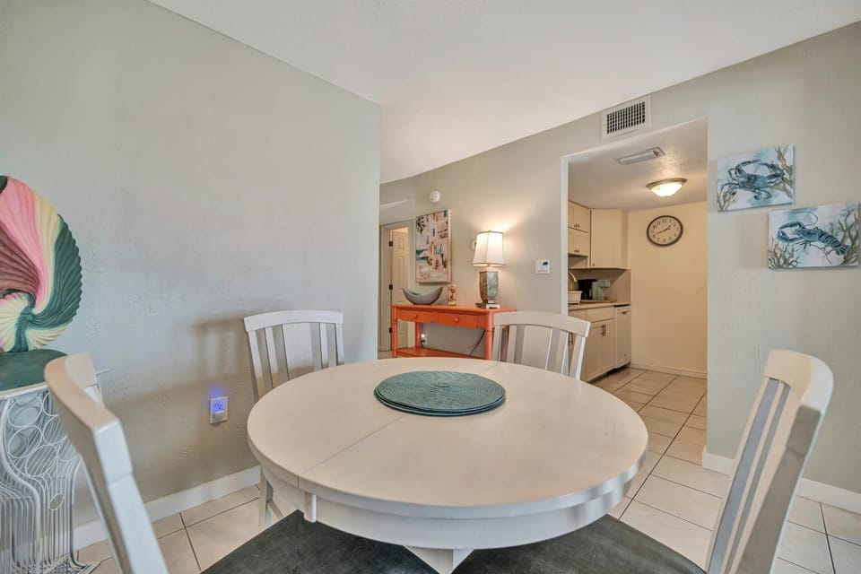Dining table with seating and coastal decor