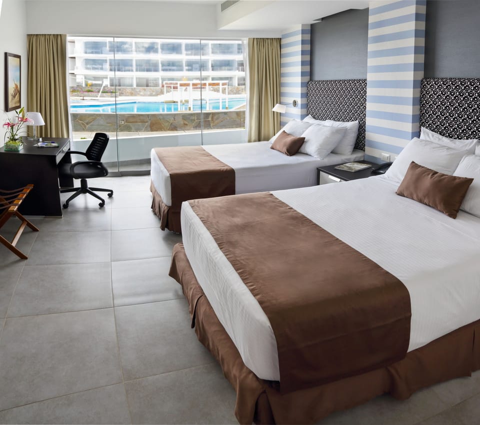 Suite, 2 Double Beds | Minibar, in-room safe, soundproofing, iron/ironing board (on request)