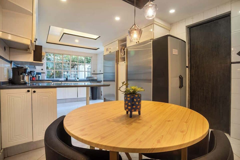 Modern kitchen with a breakfast nook, perfect for casual meals or morning coffee.