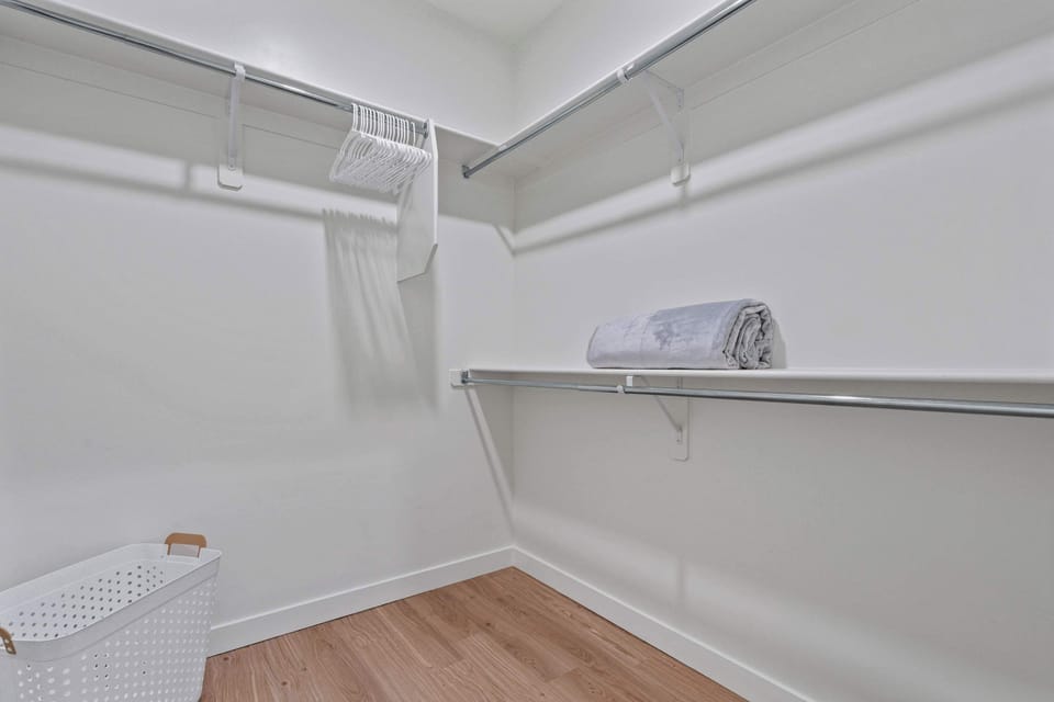  Large walk in closet with plenty of storage space, perfect for longer stays and organization
