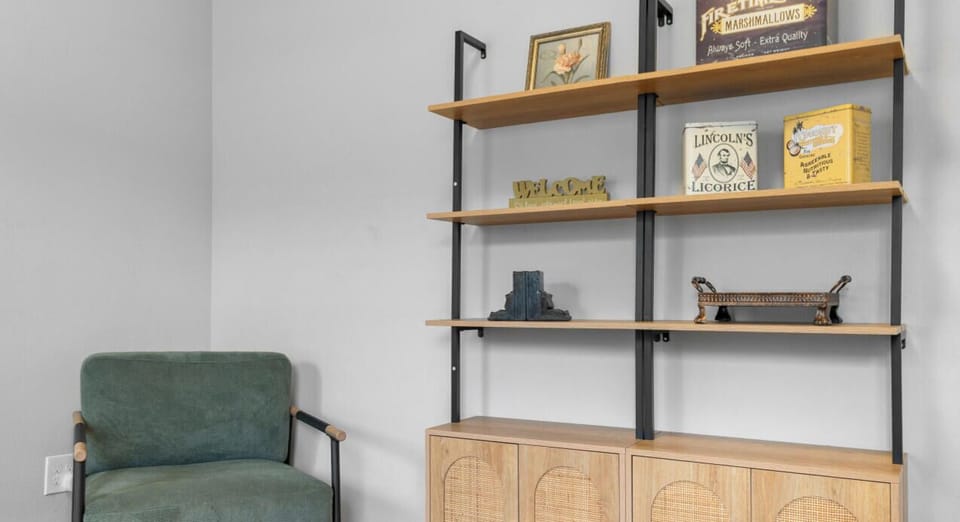 Clean lines, natural textures, and a comfortable accent chair create a polished little spot to relax.