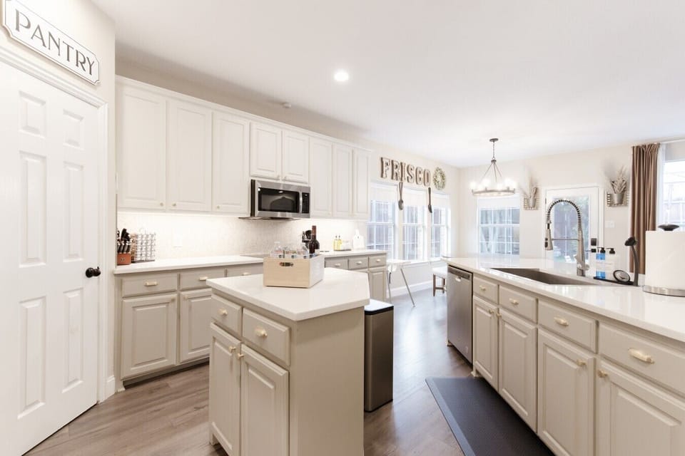 Fully equipped kitchen with modern appliances, island space, and everything needed for longer stays.
