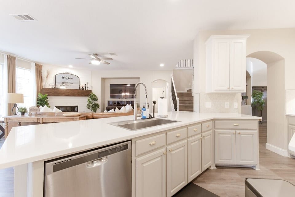 Fully equipped kitchen with modern appliances, island space, and everything needed for longer stays.