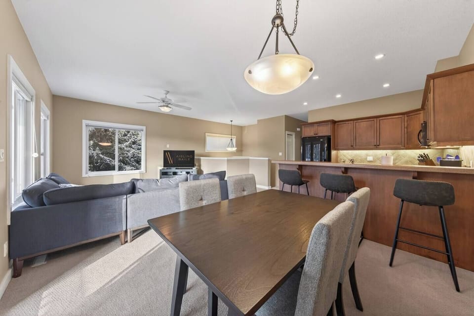 Main floor dining area with walkout access to the balcony.