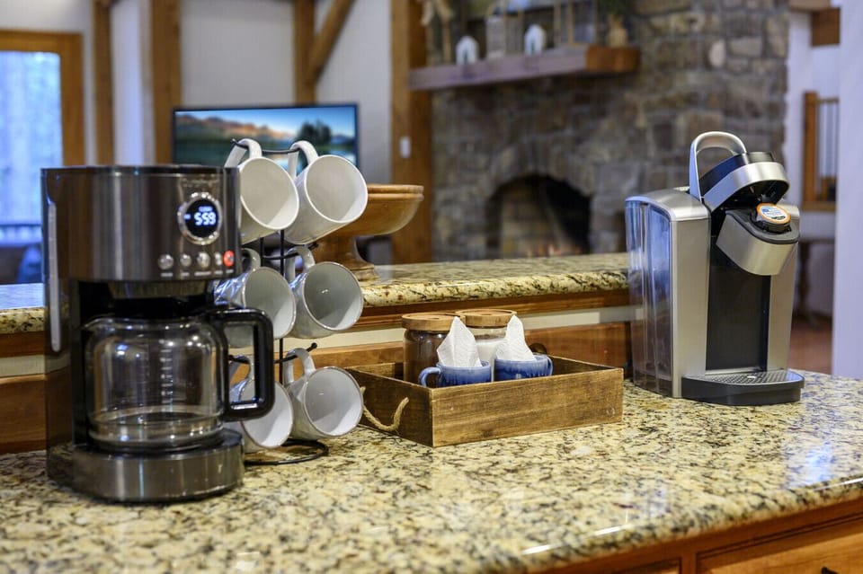 Multiple brewing options and coffee supplies are provided for your stay.