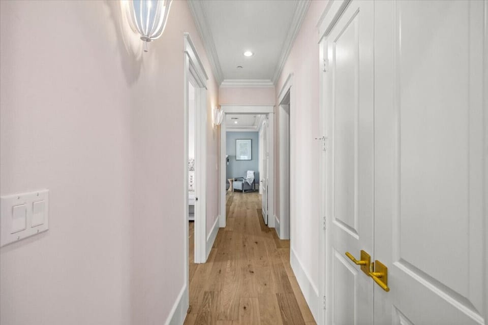 Bright & airy hallways guide you through the home