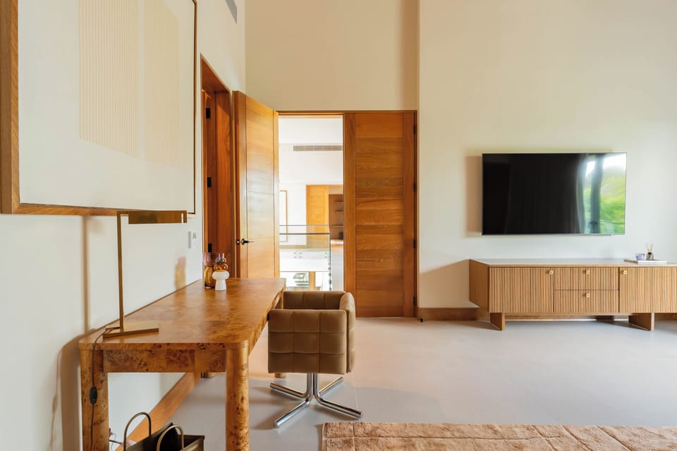 Built-in desk area offers a convenient spot to work, read, or plan the day