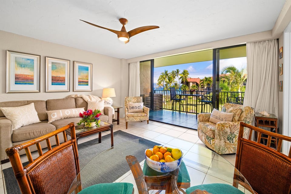 Your comfortable living room, with gorgeous ocean and resort views out on the lanai