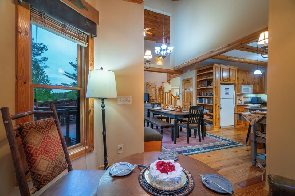 Breakfast nook overlooks kitchen and upper deck
