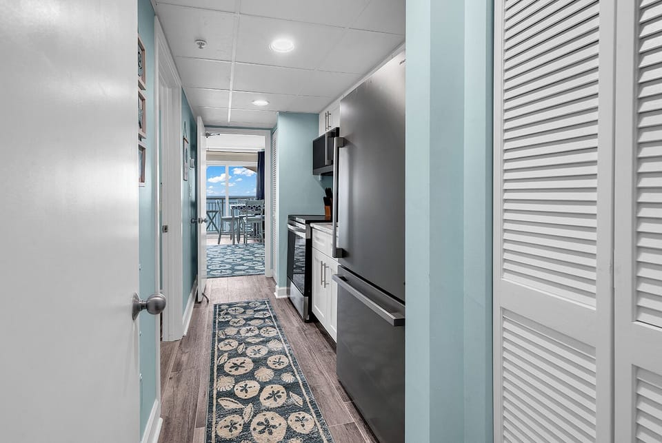 Galley-style kitchen that looks straight through to the ocean!