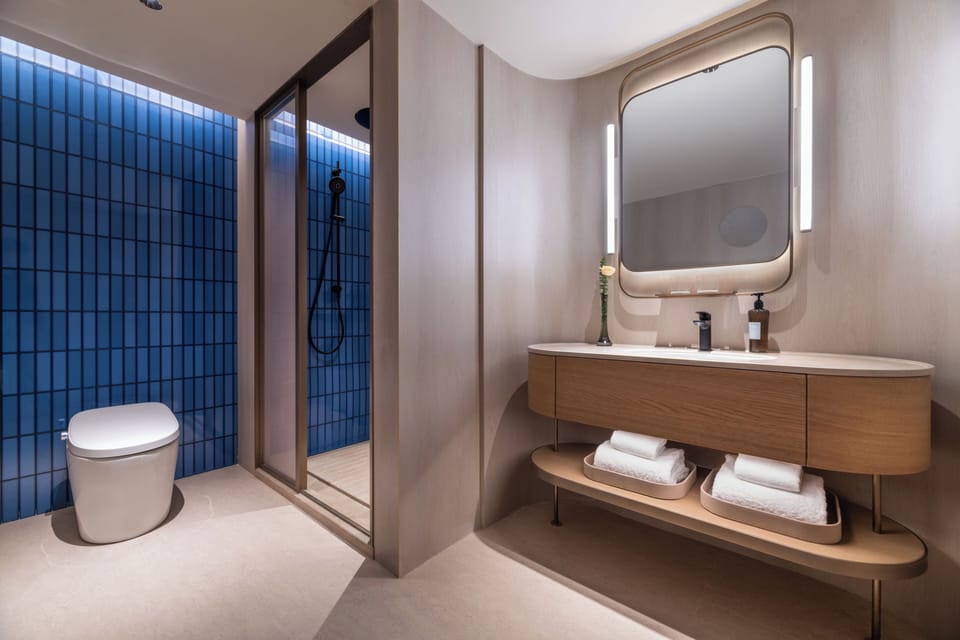 Shower, rainfall showerhead, eco-friendly toiletries, hair dryer